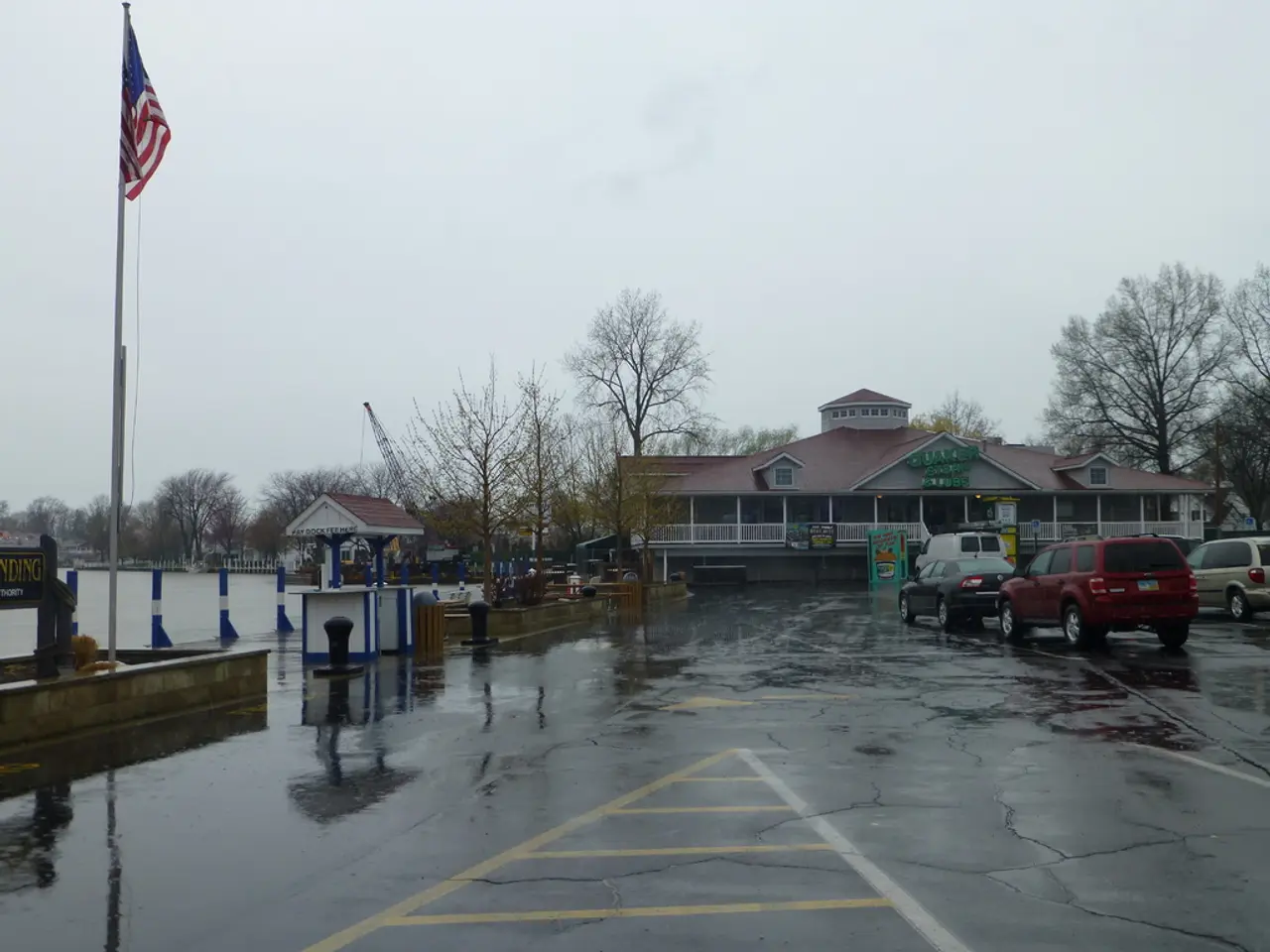 In the right side few cars are there on this road, in the middle it is a house. In the left side...