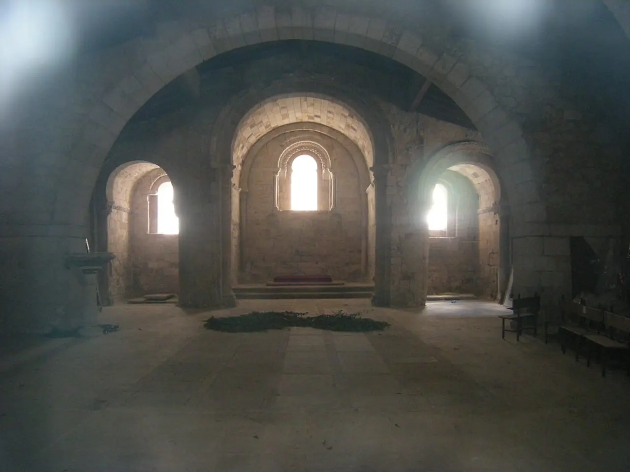 In this picture there is a inside view fort. In the front there are three arches and small windows...
