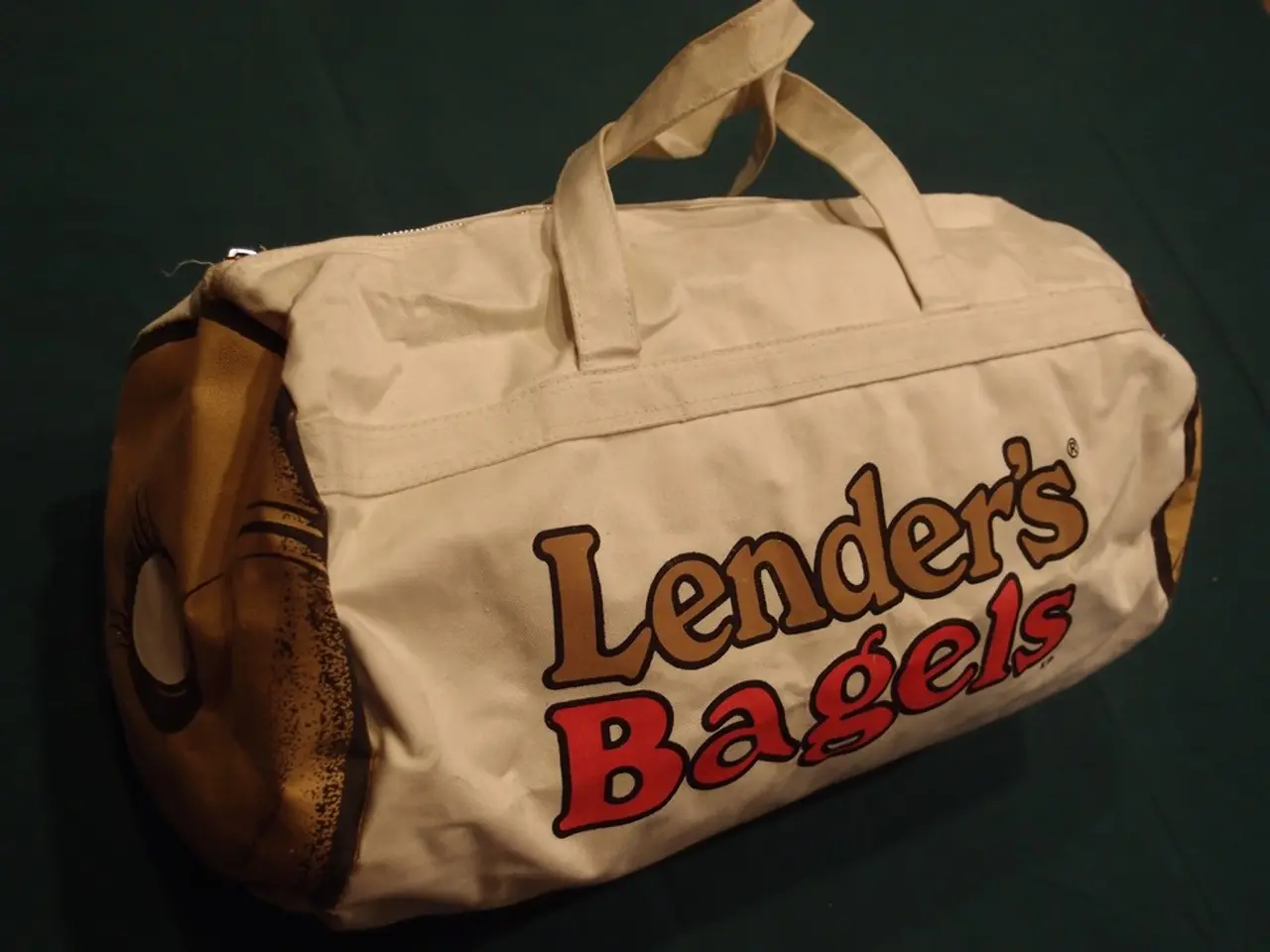 In this picture is a white color handbag. The background of the bag is in green color. On the bag...