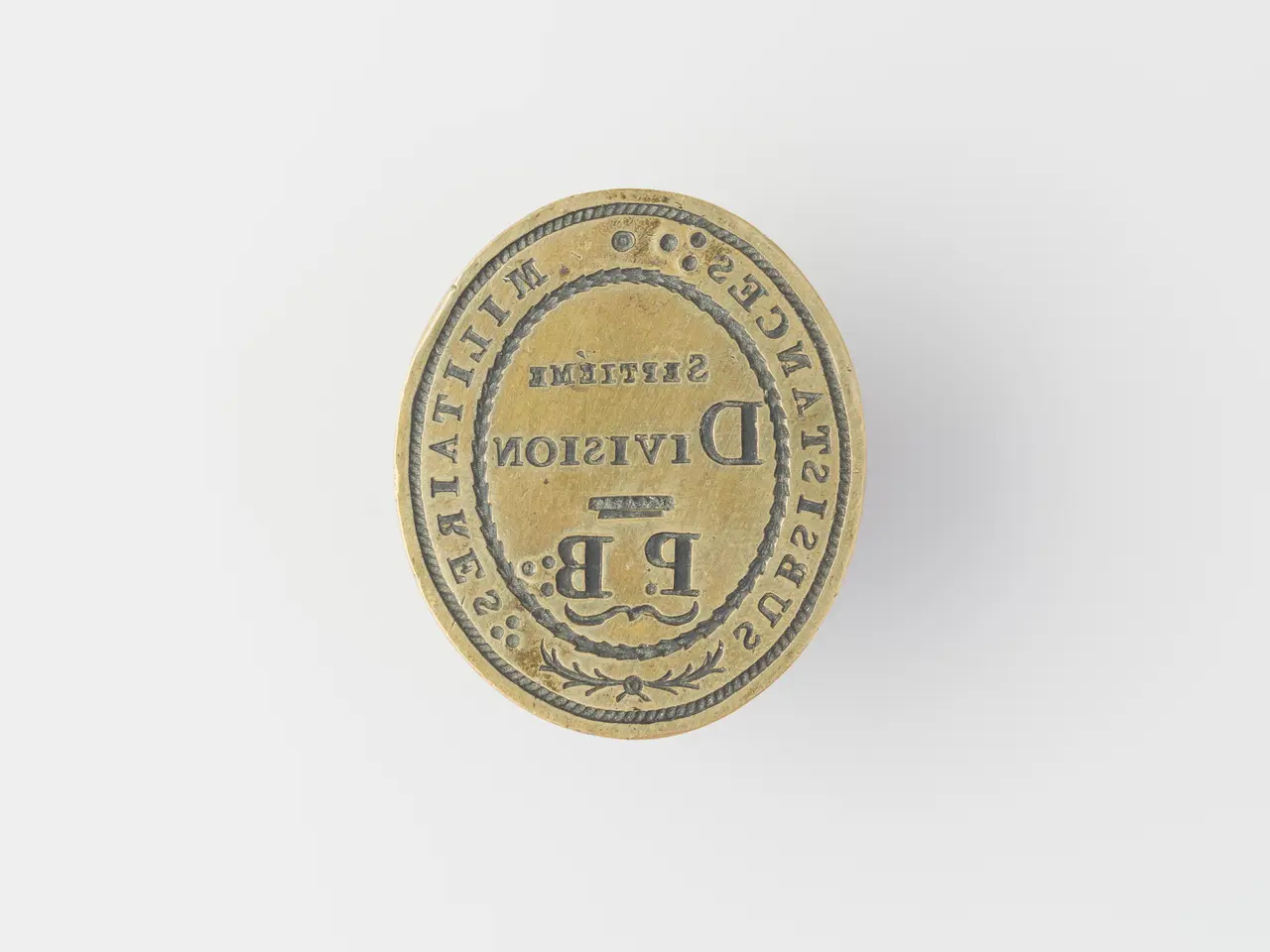 The image shows a gold coin with the word "Division" written on it against a white background.