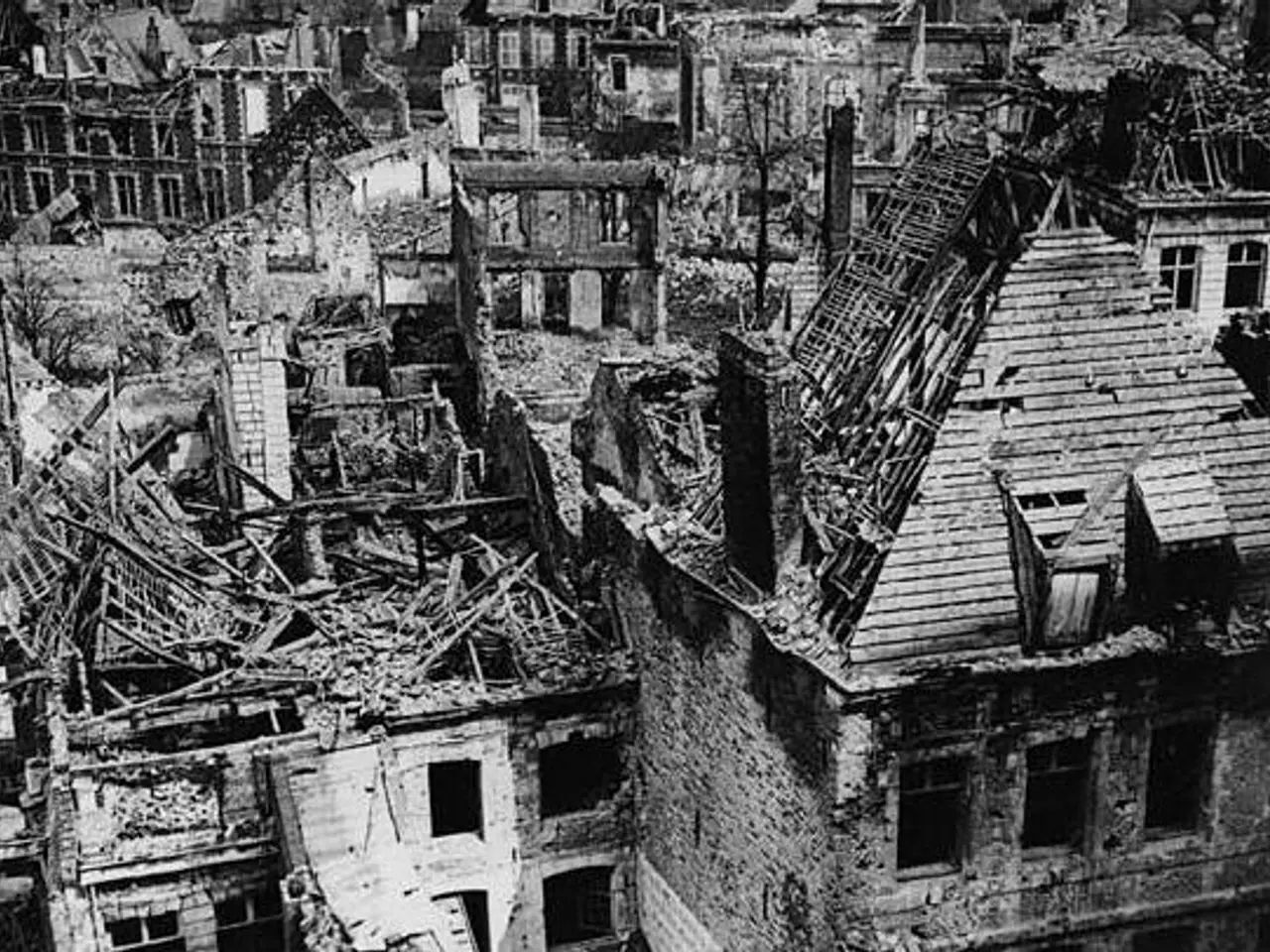 The image shows a black and white photo of a city with a lot of buildings that have been destroyed,...