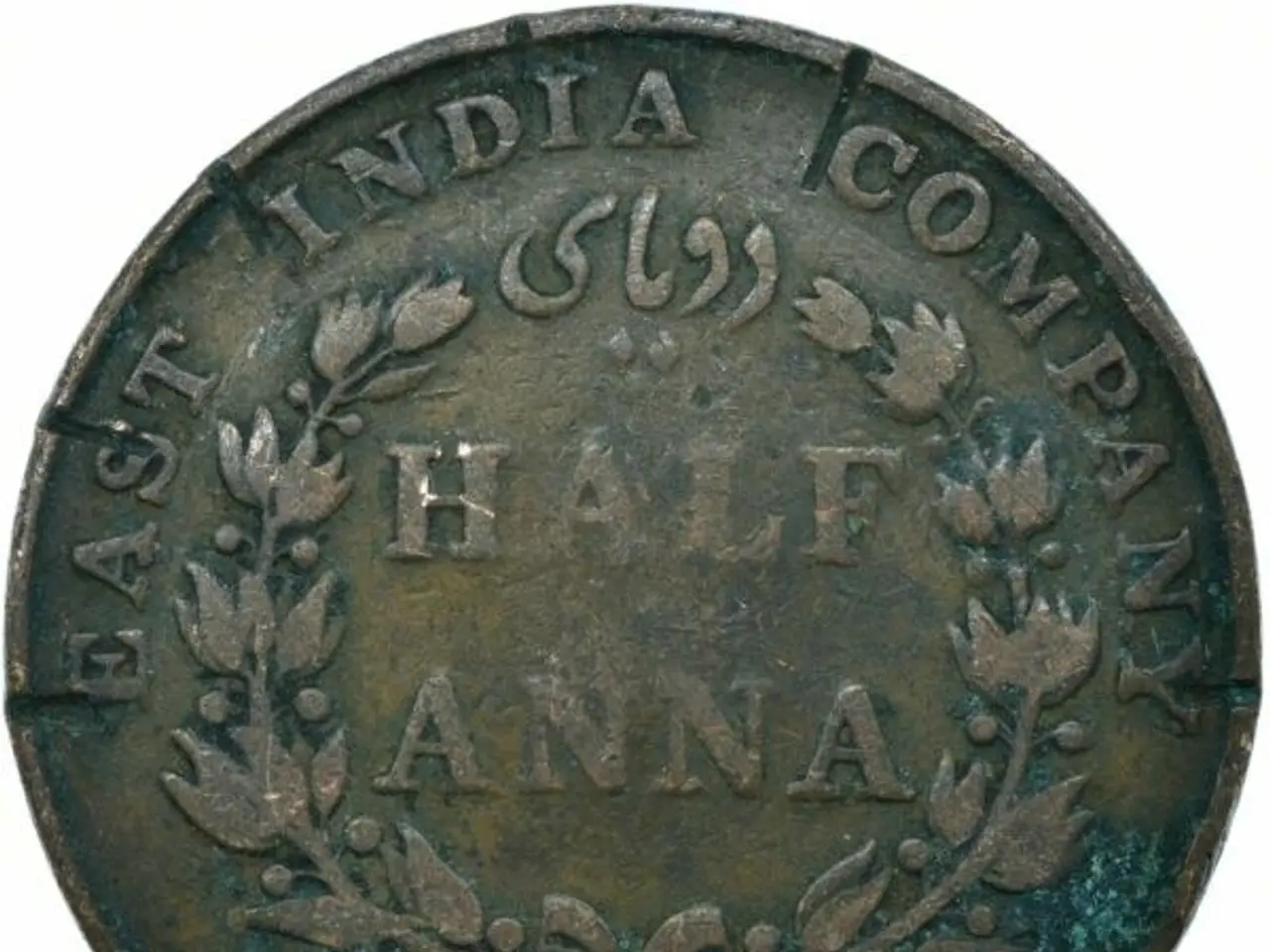 The image shows a copper coin with the words "East India Company" inscribed on it against a white...