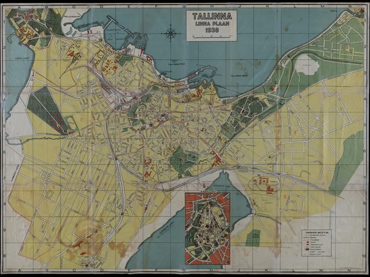 The image shows an old map of Tallinn, Estonia, with a black background. The map is detailed and...