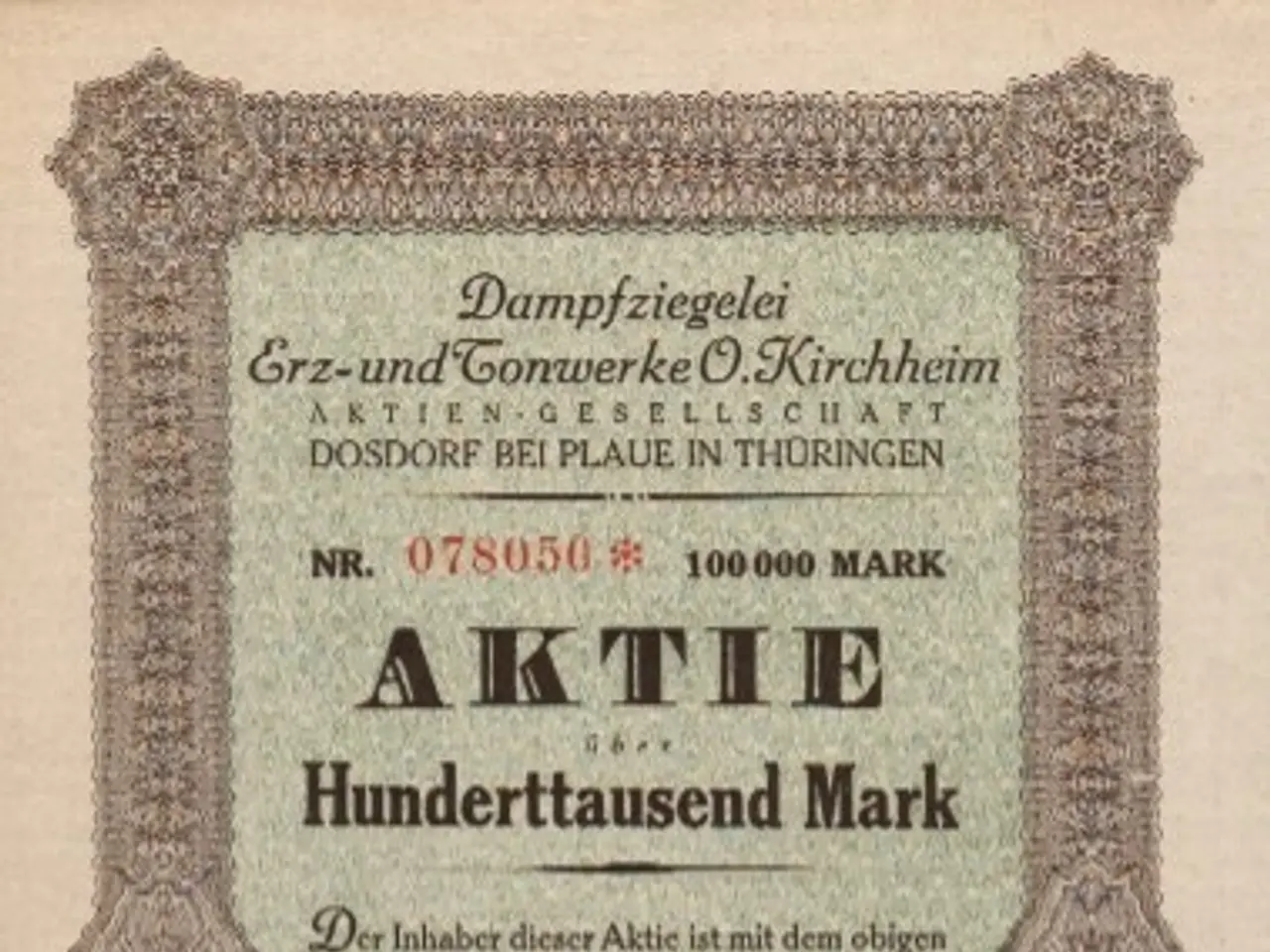 The image shows an old German stock certificate with a picture of a man on it. The certificate has...