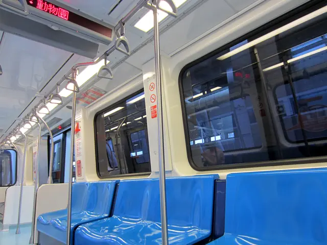 This image is a inner view of a train as we can see there are some chairs at bottom of this image...