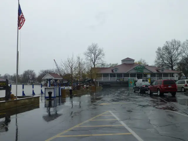 In the right side few cars are there on this road, in the middle it is a house. In the left side...