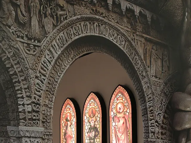 It is an inside view of house. Here we can see an arch with art. At the bottom, there is a floor....