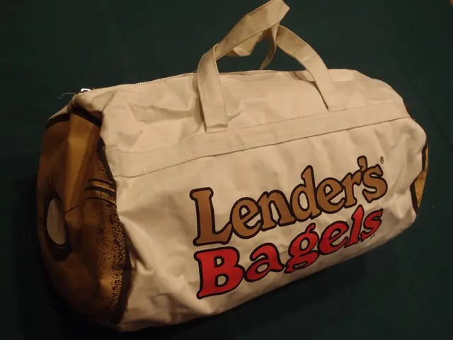 In this picture is a white color handbag. The background of the bag is in green color. On the bag...