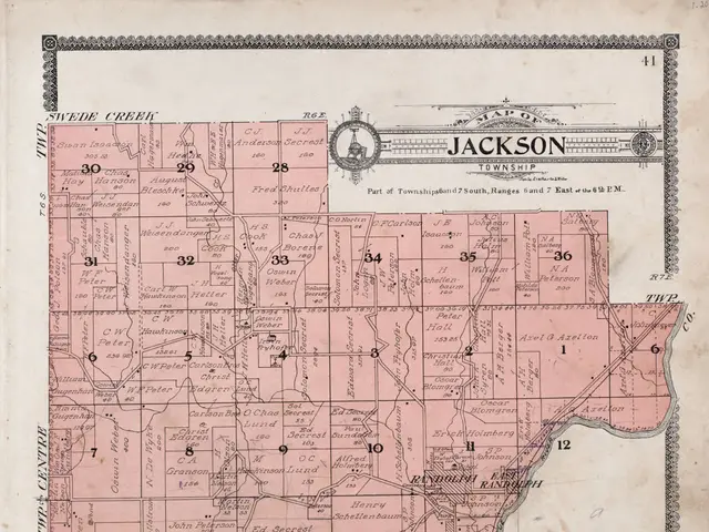 The image shows an old map of the city of Jackson, Mississippi. It is a detailed map with text and...