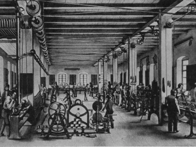 The image shows a black and white drawing of a factory with people working on machines, pillars,...