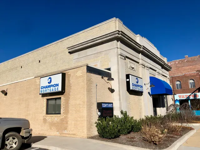 The image shows a building with windows and boards with text on them, a car parked in front of it,...