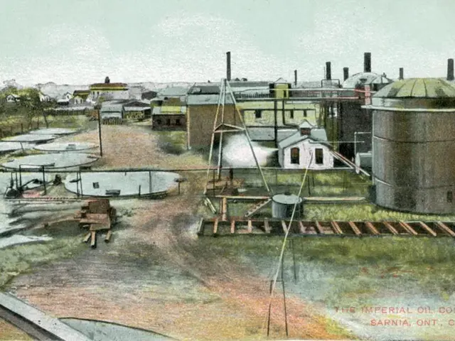 The image shows an old postcard of the Imperial Oil Company in Sarnia, Ontario, Canada. It features...