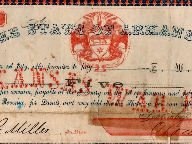 The image shows an old check with a red and blue border and a seal on it. The check has text...