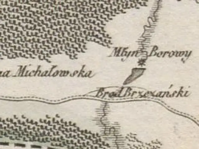 The image shows an old map of the city of Minsk, Belarus, with text written on it. The map is...