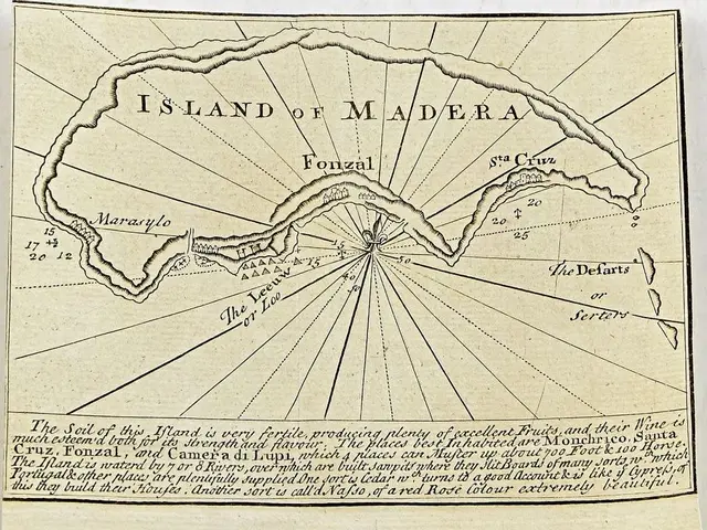 The image shows a paper with a map of the island of Madeira, with text written on it. The map is...