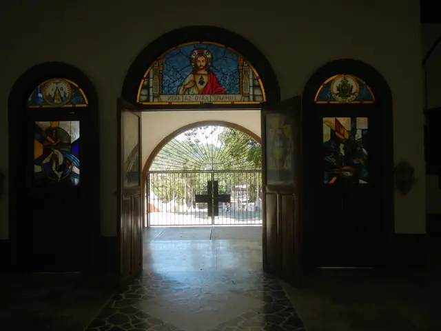 The image shows the entrance to a church with stained glass windows, doors, walls, a floor, a...