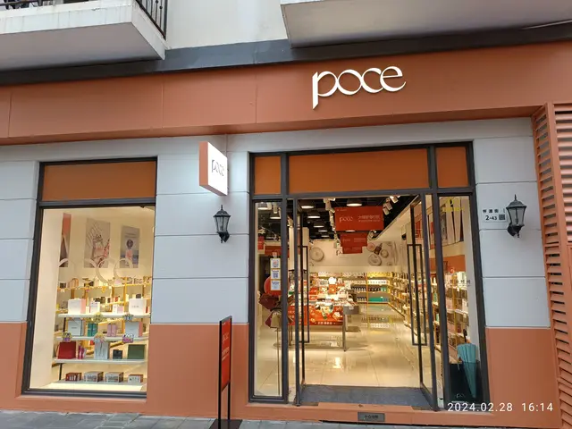 The image shows a store front with a sign that reads "pace" on it, located in the center of the...