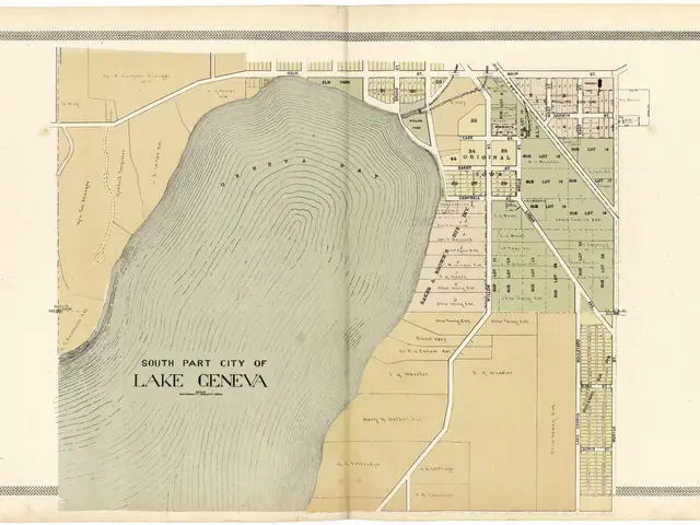 The image shows an old map of the city of Lake Geneva, with text written on it. The map is...