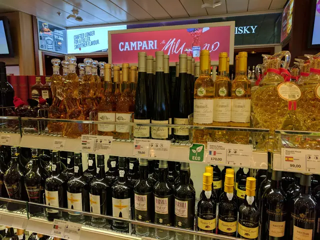 The image shows a store filled with lots of bottles of wine on display, with price tags attached to...