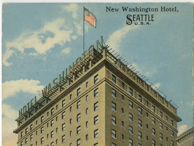 The image shows an old postcard of the New Washington Hotel in Seattle, Washington. It features a...