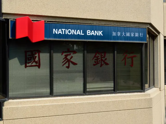The image shows a building with glass windows and a sign that reads "National Bank" with Chinese...
